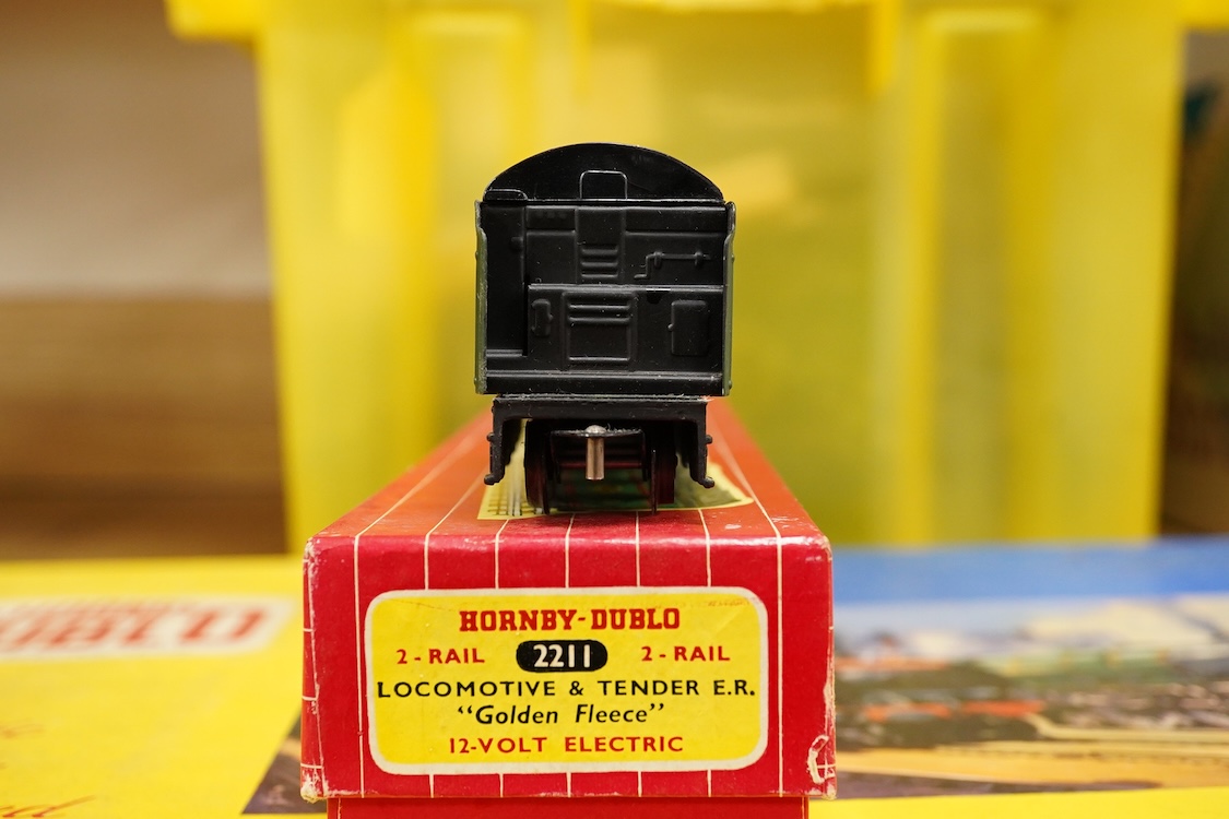 A collection of Hornby Dublo for 2 rail running, including; a boxed BR class A4 4-6-2, Golden Fleece 60030, (2211), together with three boxed bogie coaches and two wagons, plus four unboxed wagons, and a complete box set